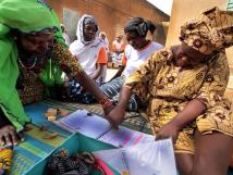 An African woman participates in a community-led health initiative