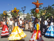 Parade of people wearing colorful clothing