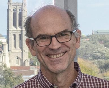 Photo of John E. Carlstrom