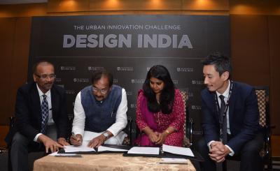 Men and women signing an agreement