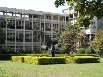 IIT Bombay's main building overlooking the "Knowledge Tree" sculpture