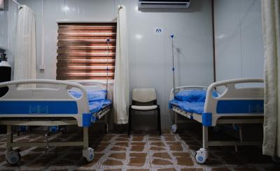 A photo of empty hospital beds