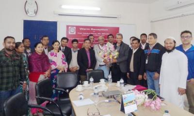 UChicago Research Bangladesh Staff taking a picture together