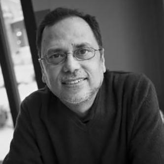Dipesh Chakrabarty in a black and white photo