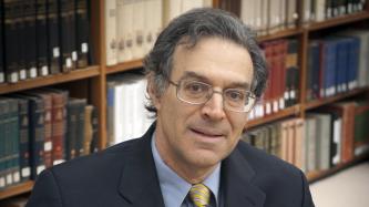 A photo of Professor Kenneth Pomeranz in his office